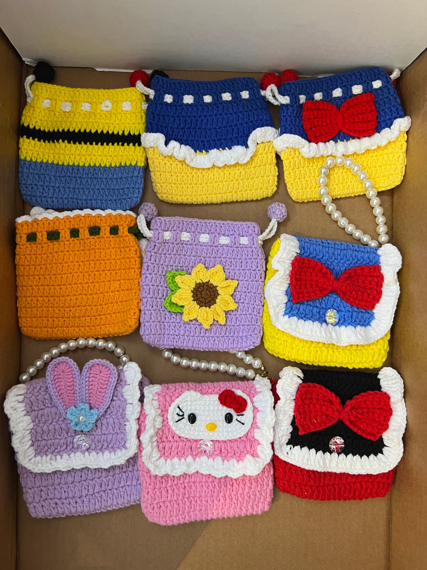 Small hand-knitted coin bag